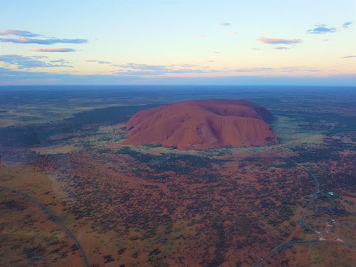 Ayers Rock in the sunset from the air